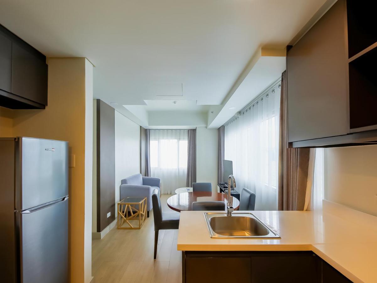 Capital O 804 The Residences At Bonifacio Civic Center Manila Exterior foto