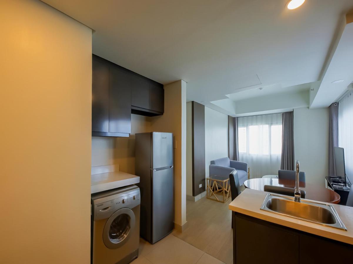Capital O 804 The Residences At Bonifacio Civic Center Manila Exterior foto