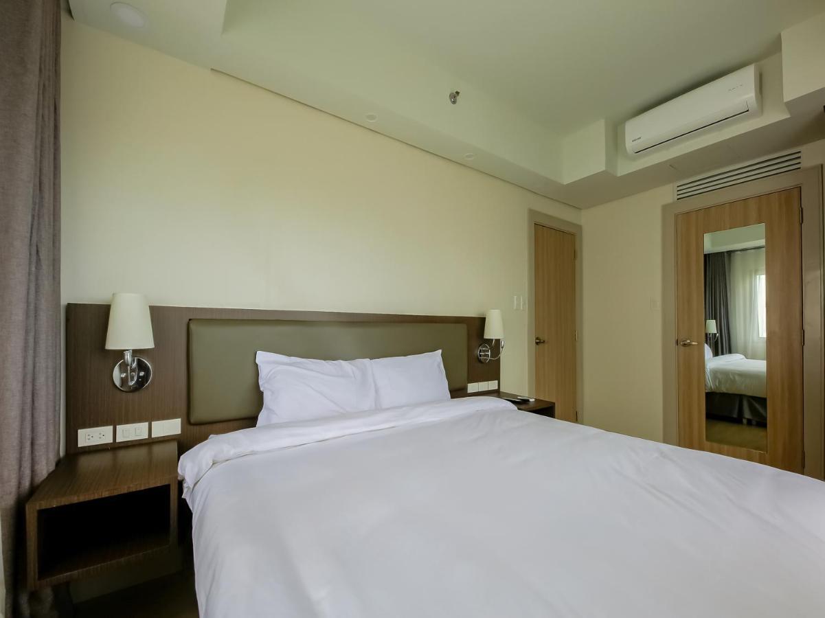 Capital O 804 The Residences At Bonifacio Civic Center Manila Exterior foto