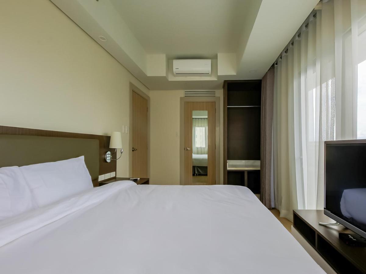 Capital O 804 The Residences At Bonifacio Civic Center Manila Exterior foto